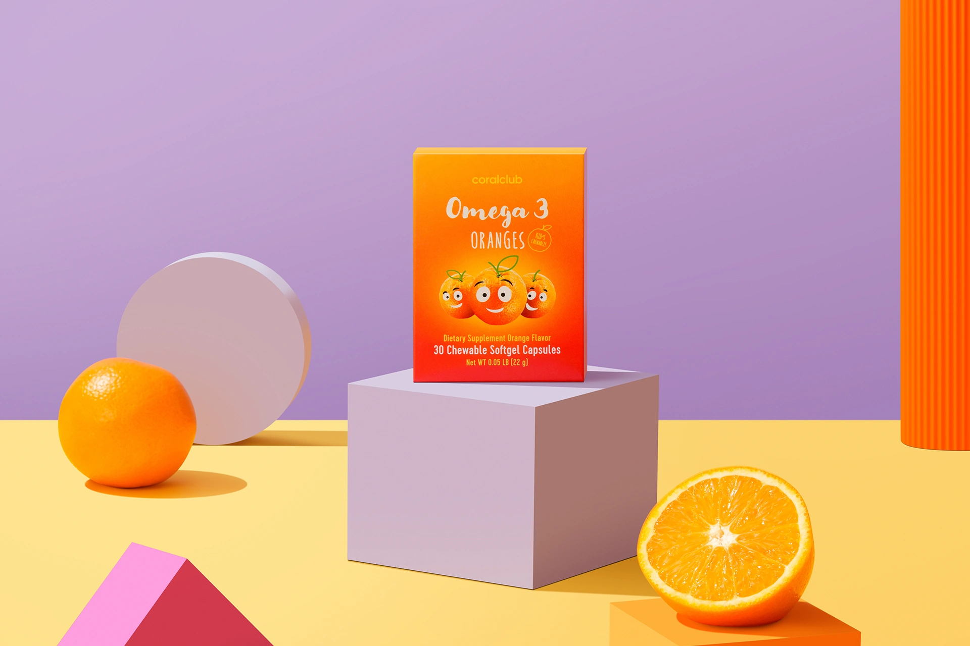 Omega 3 Oranges capsules in a lifestyle setting with fresh oranges